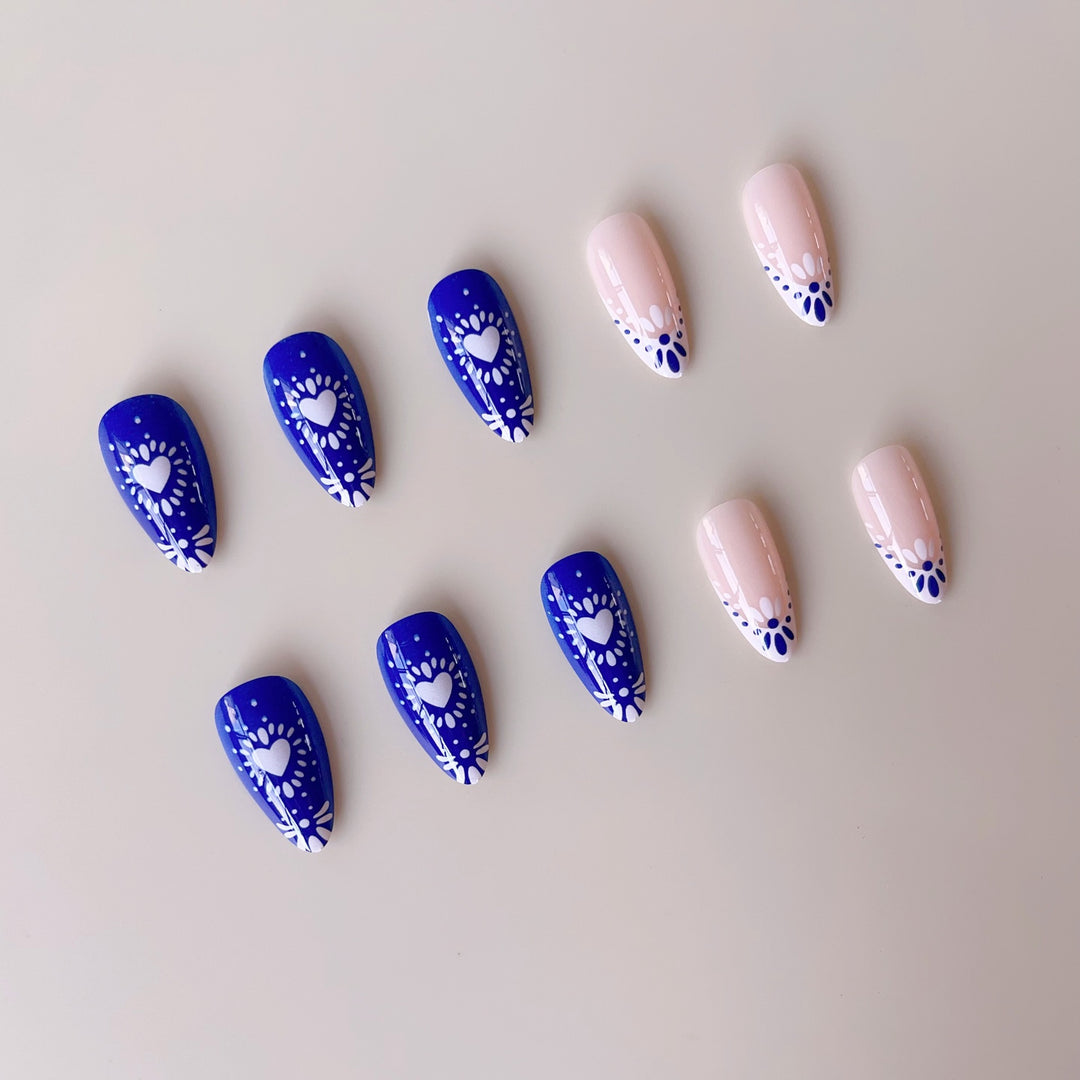 Kunstnagelset mit kreativen Blumen- und Herzmotiven Karnz