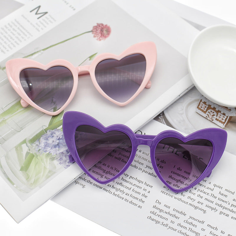 Damen Herzförmige Sonnenbrille mit glitzerndem Rahmen Karnz