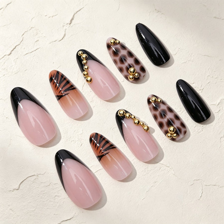 Kunstnagelset mit eleganten Tier- und Glitzermustern Karnz