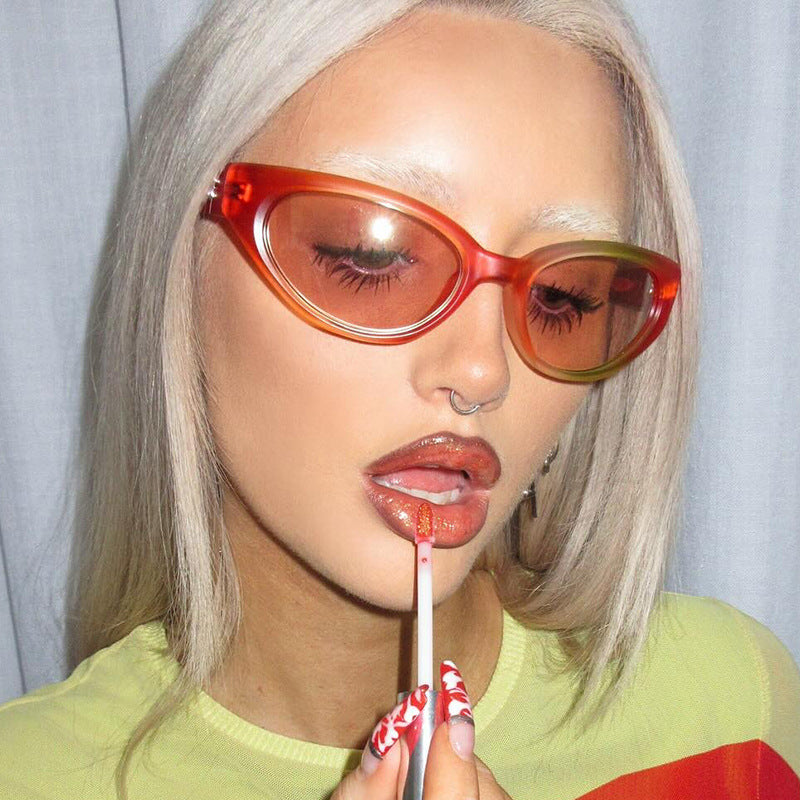 Damen extravagante Sonnenbrille mit geschwungenem Design Karnz