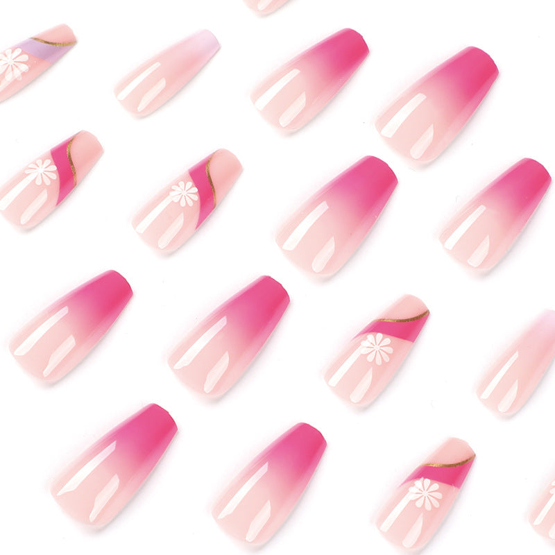 Kunstvolle Nagelverlängerungen mit buntem Ombre-Design und floralen Akzenten Karnz