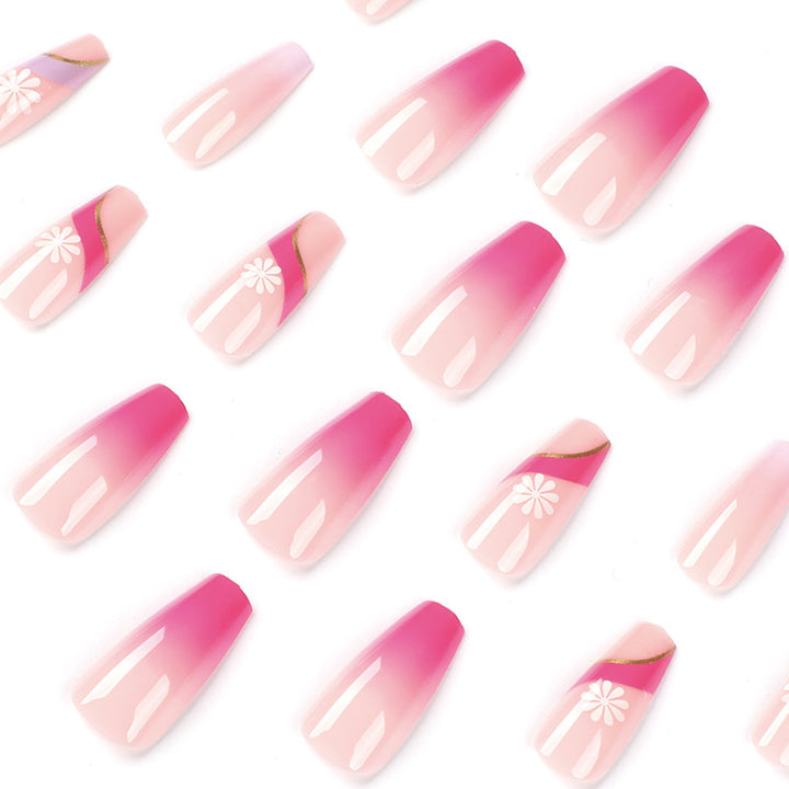 Kunstvolle Nagelverlängerungen mit buntem Ombre-Design und floralen Akzenten Karnz