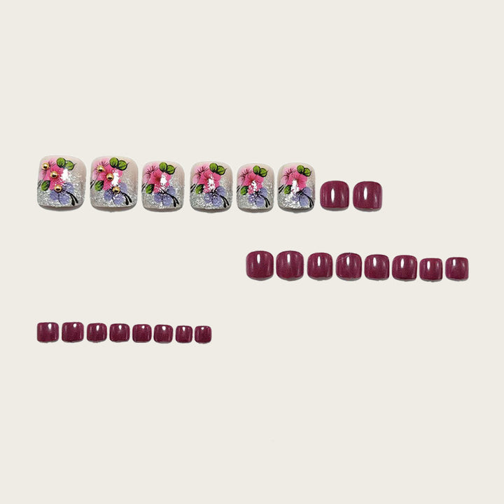 Kunstnägel mit Floralen Designs und Glitzereffekten Karnz