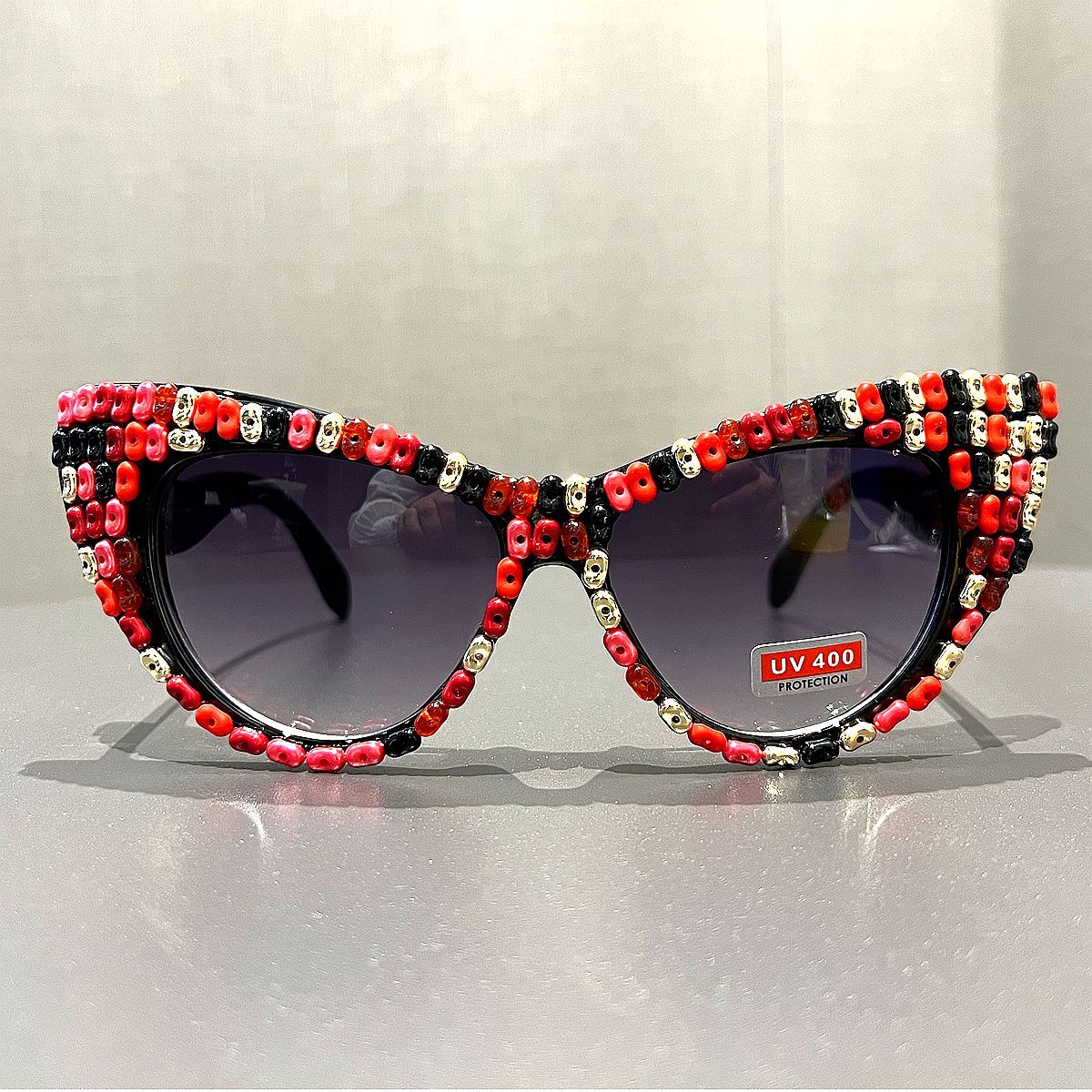 Damen Cat-Eye Sonnenbrille mit farblich akzentuiertem Rahmen Karnz