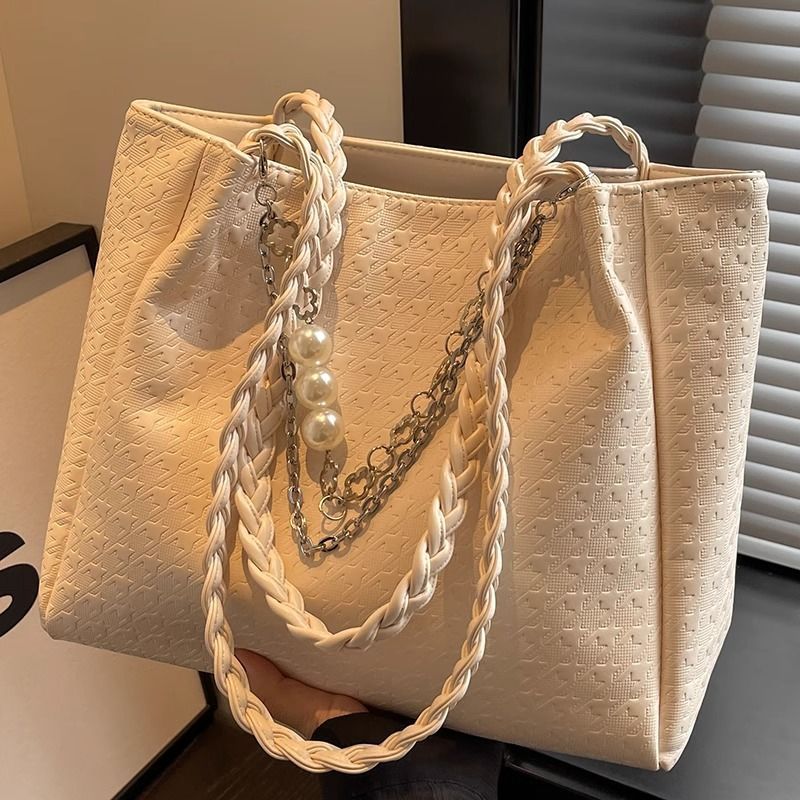 Luxuriöse strukturierte Handtasche Karnz