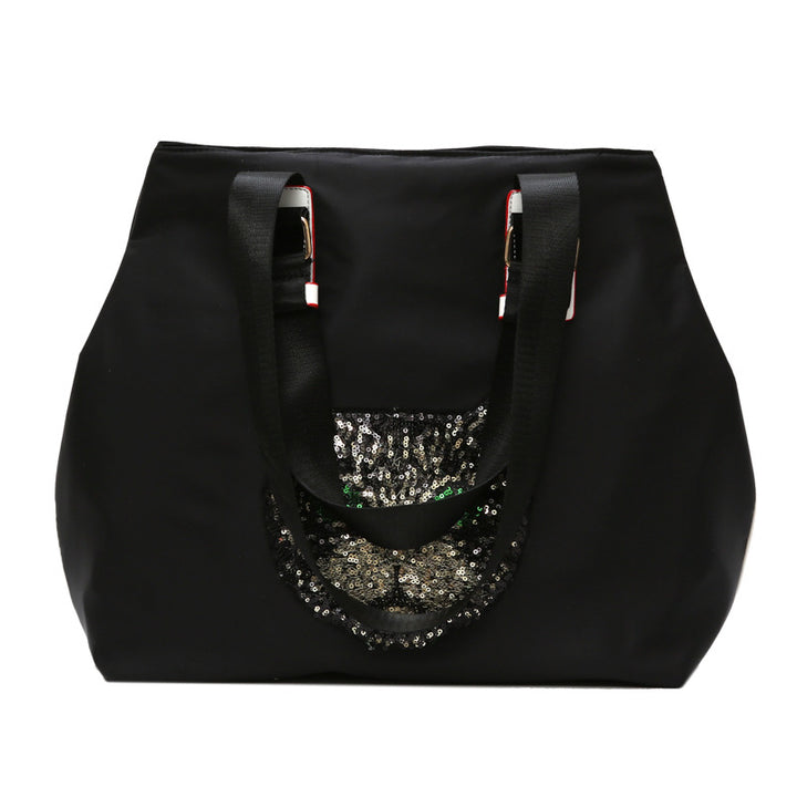Stylische mit Pailletten dekorierte Tragetasche