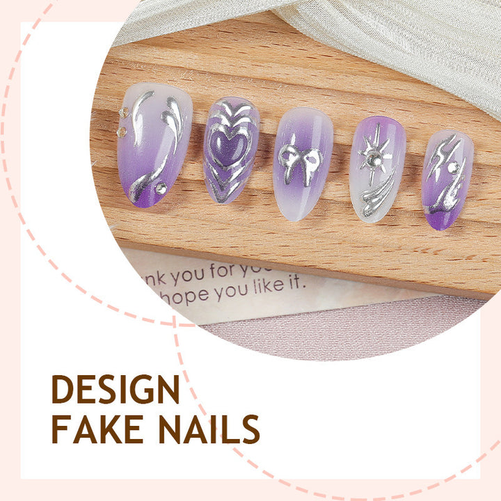Kunstnagelset mit elegantem Ombre-Design und filigranen Verzierungen Karnz