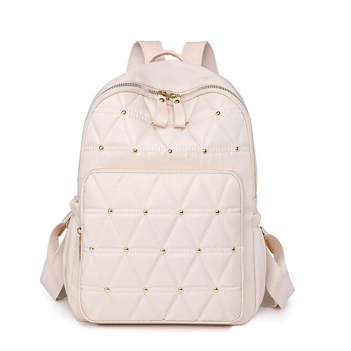 Stylische gesteppten Rucksack mit goldenen Akzenten