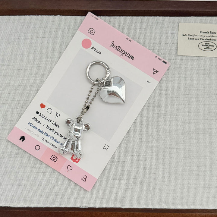 Herzförmiger Charm-Schlüsselanhänger mit Schleife Karnz