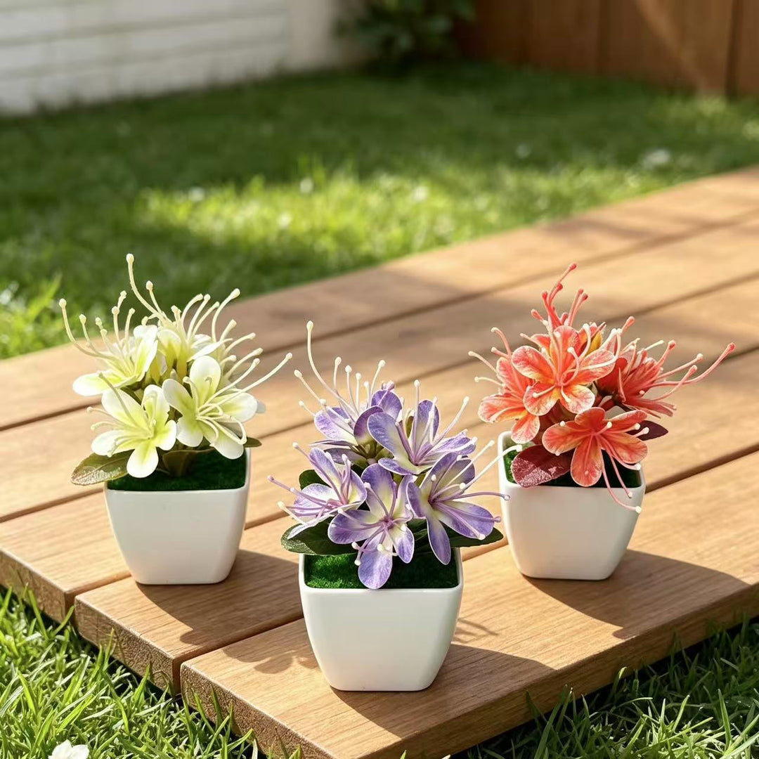 Lebensechte florale Tischmitte für die innere Wohnkultur