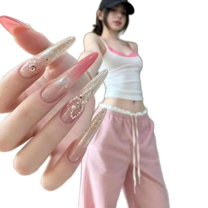 Elegante Stiletto-Nagelerweiterungen mit Strassakzenten