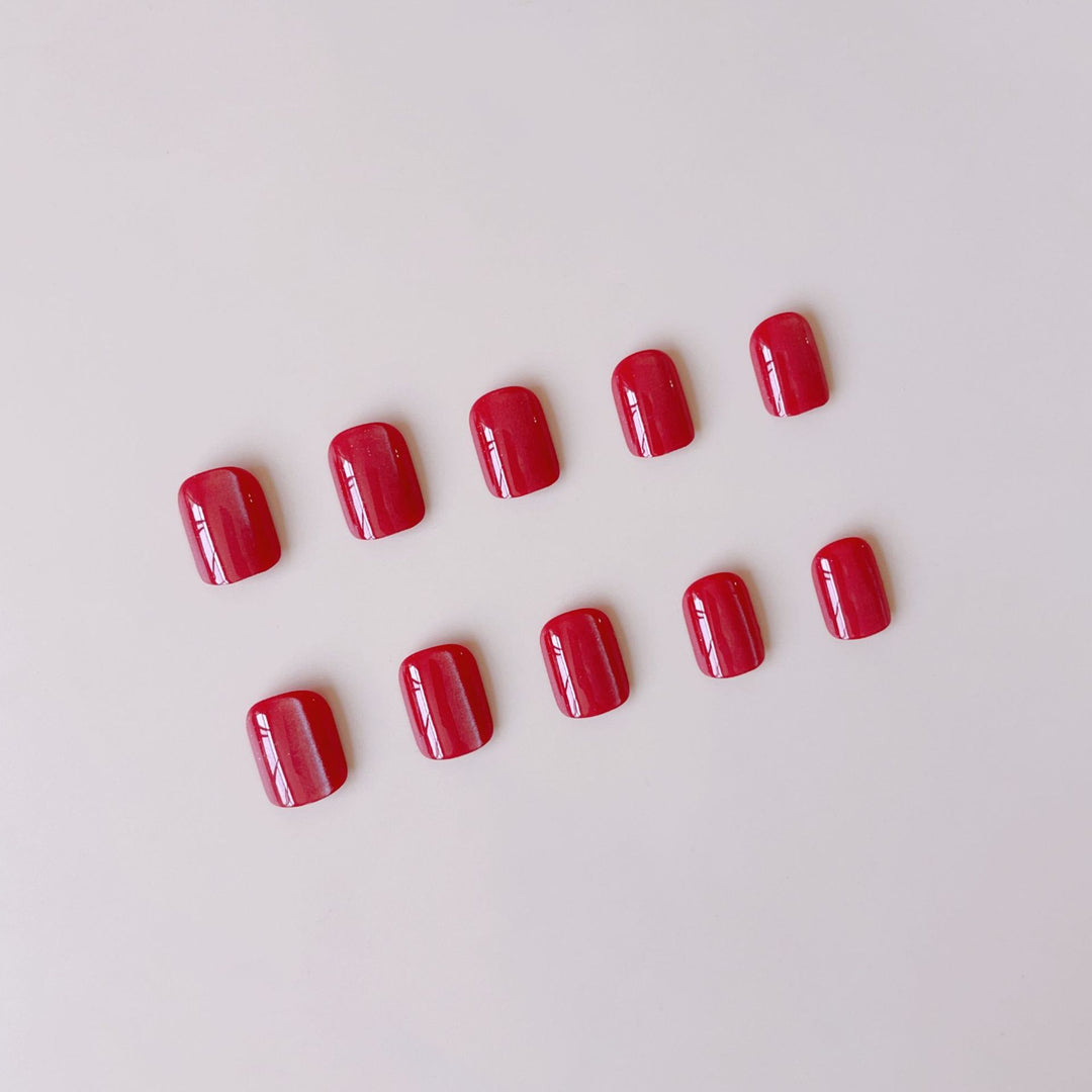 Kunstnagelset mit glänzendem Bordeaux-Finish Karnz