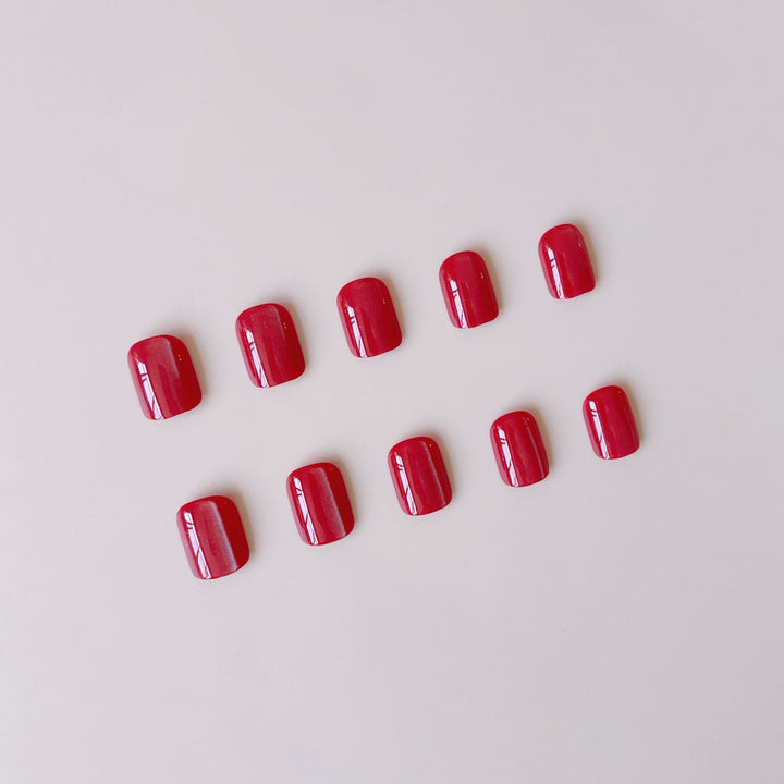 Kunstnagelset mit glänzendem Bordeaux-Finish Karnz