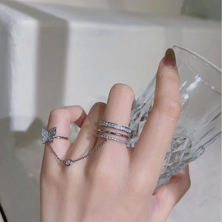 Verspieltes Ring-Set mit Schmetterlings-Elementen Karnz
