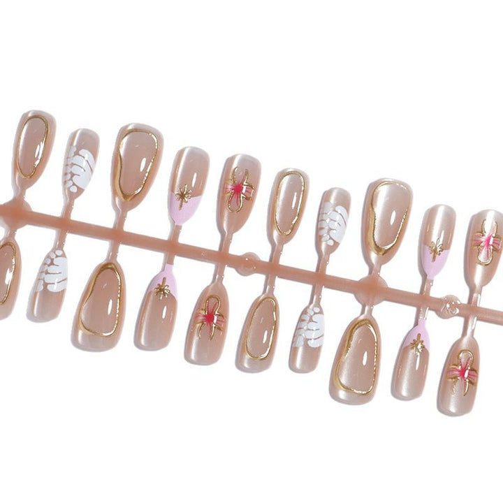 Künstlerisches Press-On-Nagelset mit eleganten floralen Akzenten Karnz