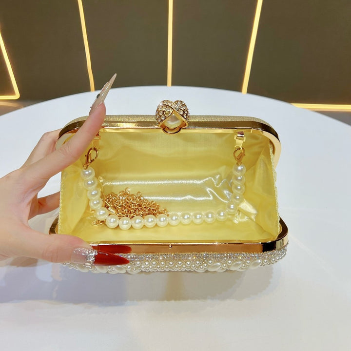 Perlenverzierte Abendhandtasche