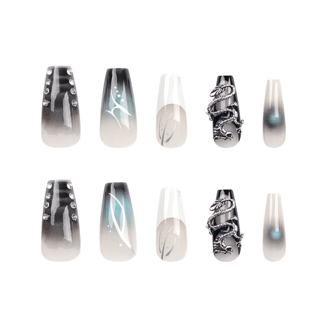 Kunstvolle Acryl-Nägel im eleganten Ombre-Design mit aufwendigen Details Karnz
