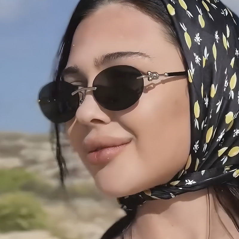 Damen ovale Sonnenbrille mit luxuriösem Metallrahmen und verspiegelten Gläsern Karnz