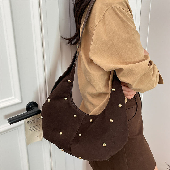 Texturiertes Wildleder Hobo Bag mit dekorativen Nieten Karnz