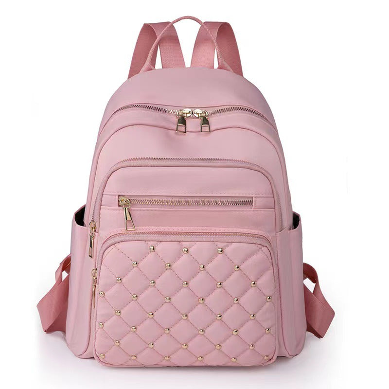 Quilted Rucksack mit dekorativen Nieten Karnz