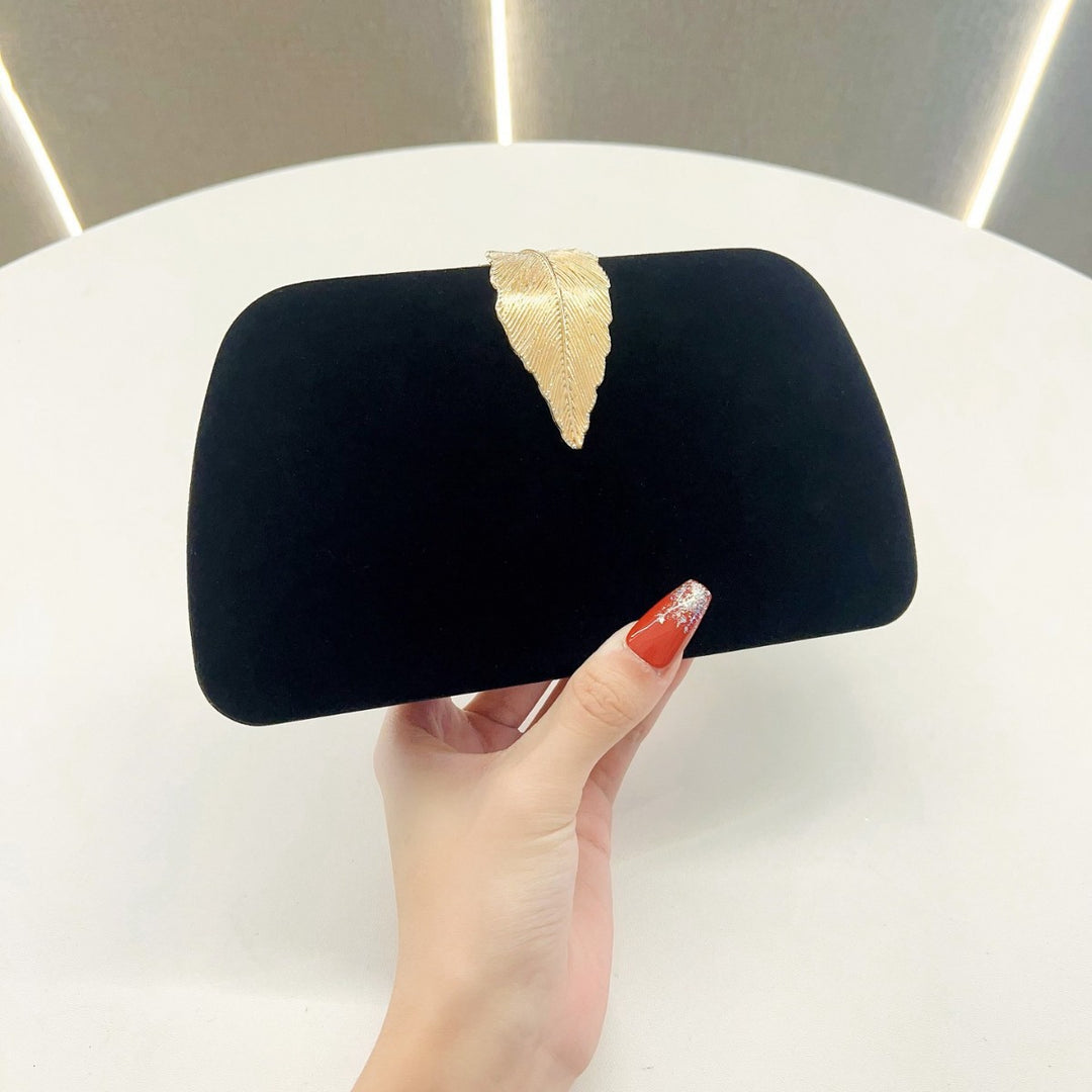Elegante abendhandtas mit Blattakzenten