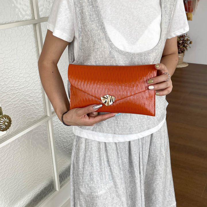 Elegante Patelleder Abend-Clutch
