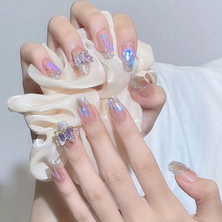 Kunstnagelset mit Glitzer- und 3D-Schmetterlingsverzierungen Karnz