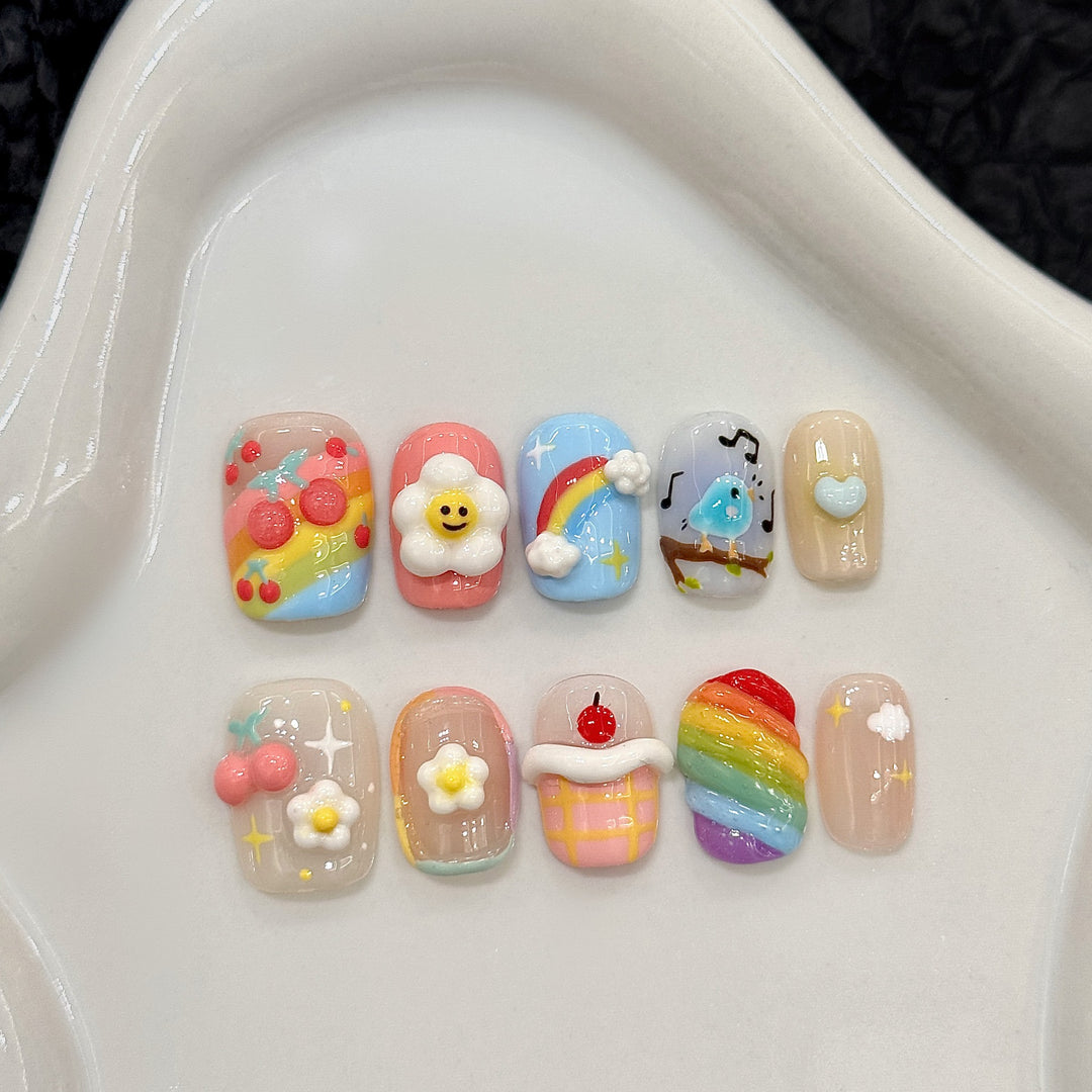 Verspieltes Druck-on-Nagelkunst-Set mit Cartoon-Designs