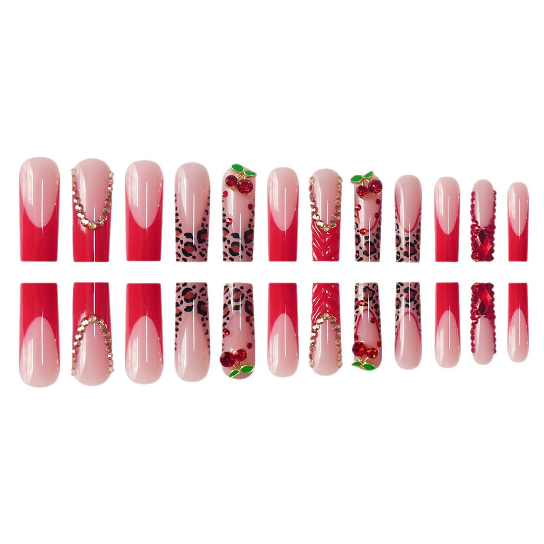 Dekorativer Langer Press-On Nagelset mit Edelstein- und Blumenakzenten Karnz