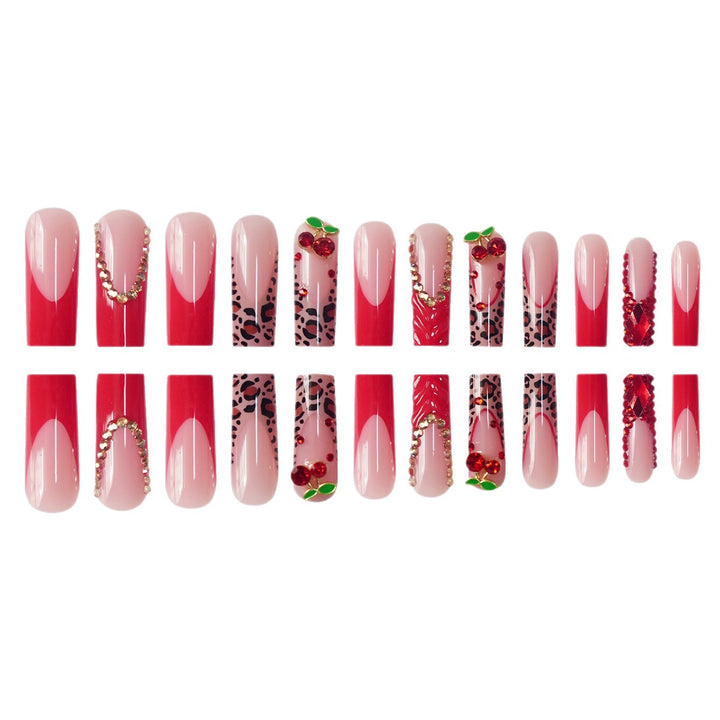 Dekorativer Langer Press-On Nagelset mit Edelstein- und Blumenakzenten Karnz