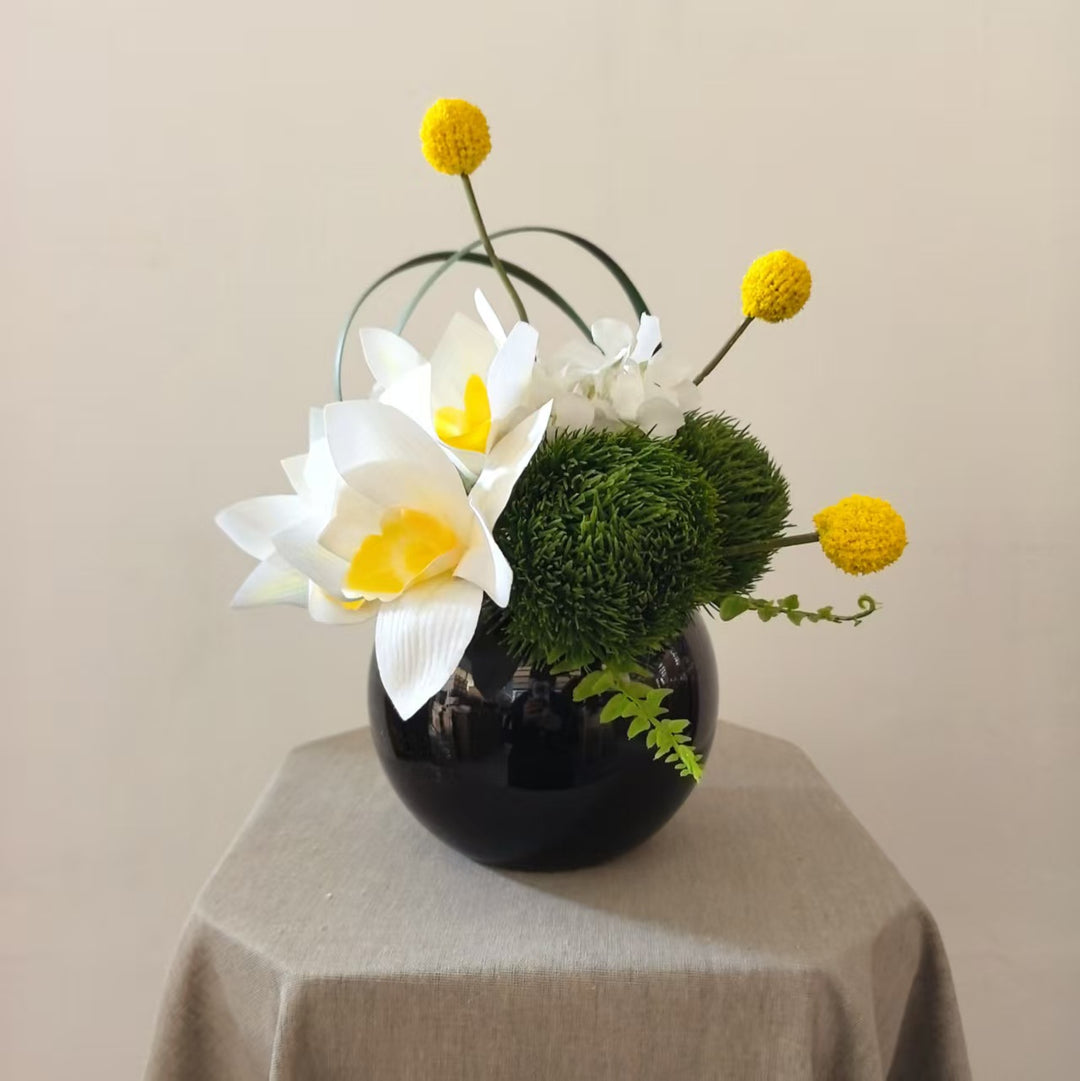 Elegante dekorative Orchideenarrangement
