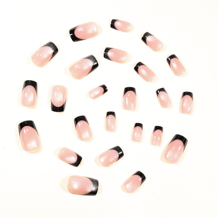 Elegante schwarzspitzen Gel-Nagelerweiterungen Karnz