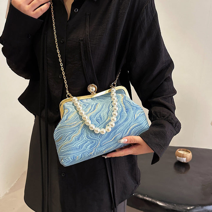 Elegante perlenverzierte Abendhandtasche