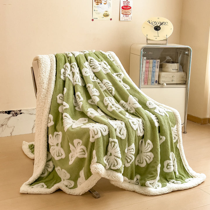 Gemütliche floral gemusterte Fleece-Decke