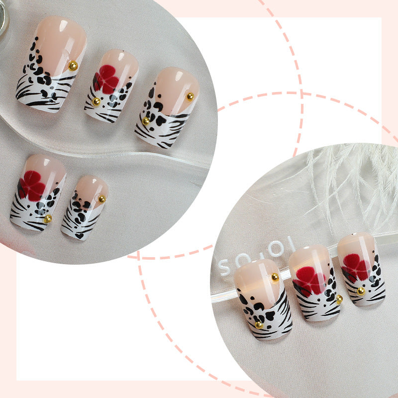 Kreatives Kunst Press-On Nagelset mit Blumen- und Zebra-Designs Karnz