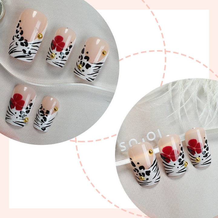 Kreatives Kunst Press-On Nagelset mit Blumen- und Zebra-Designs Karnz