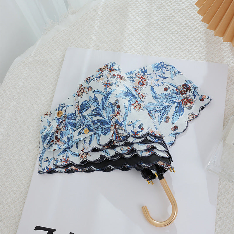 Damen eleganter Automatischer Faltregenschirm mit floralen Details Karnz