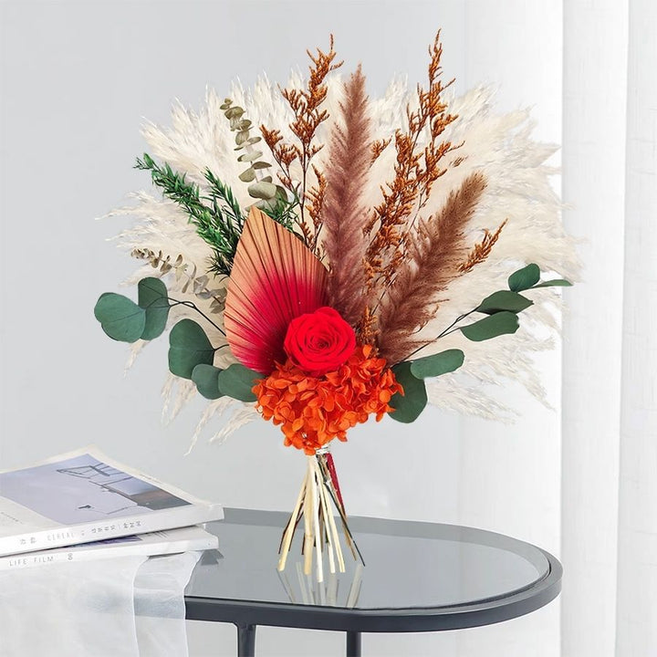 Elegante getrocknete Blumenarrangement Tischdekoration