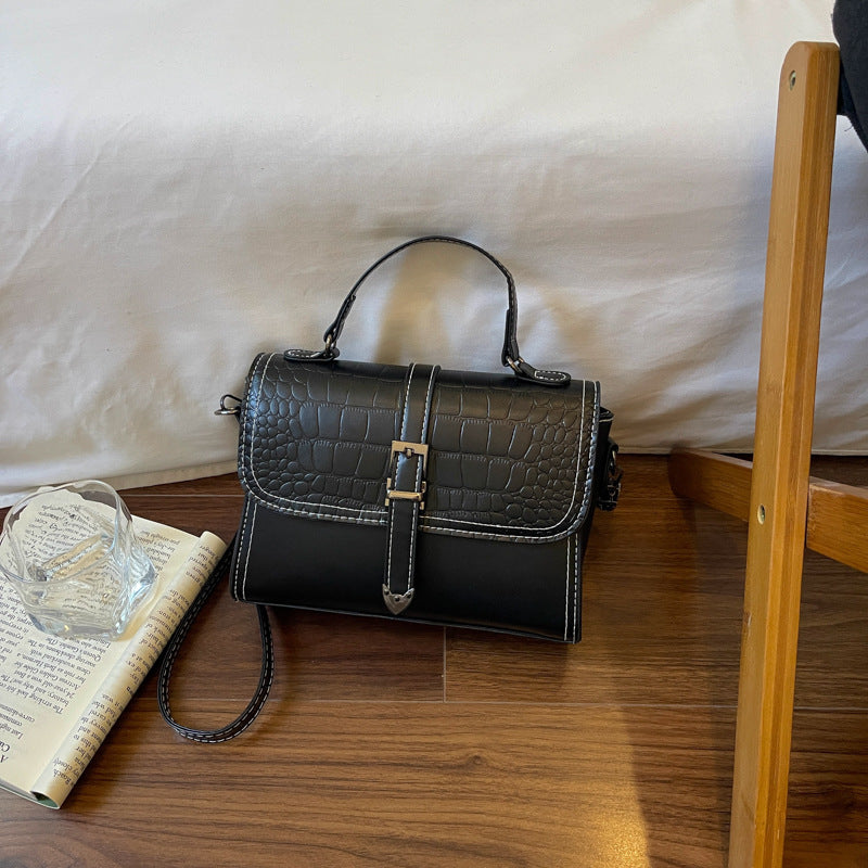 Elegante Krokodilmuster-Handtasche