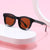 Damen Sonnenbrille im modernen, quadratischen Design Karnz