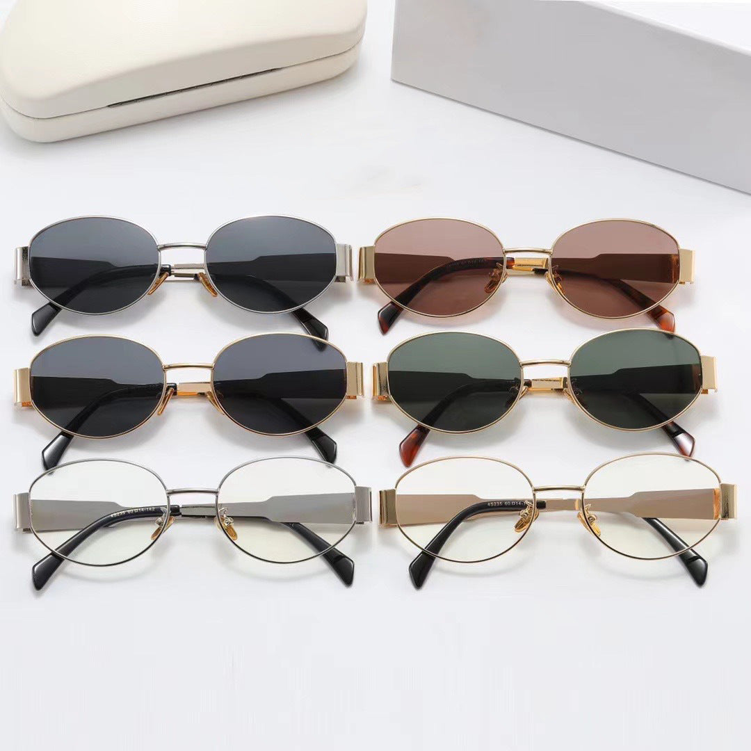 Damen elegante ovale Sonnenbrille mit goldfarbenem Rahmen Karnz