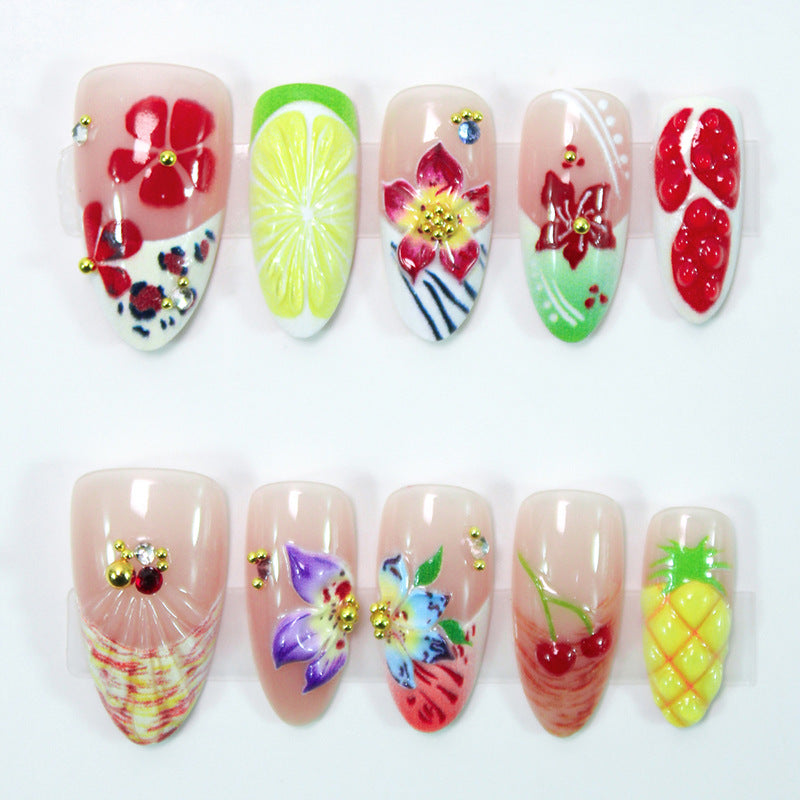 Kunstnagelset mit floralen und maritimen Akzenten Karnz