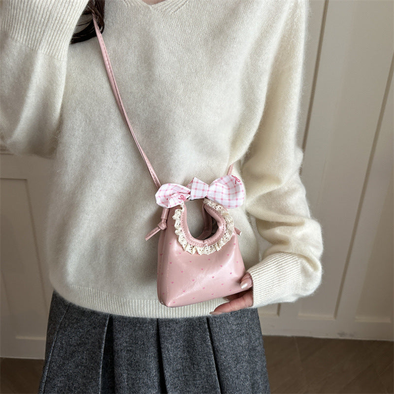 Charmante Mini-Handtasche mit Schleifenakzent