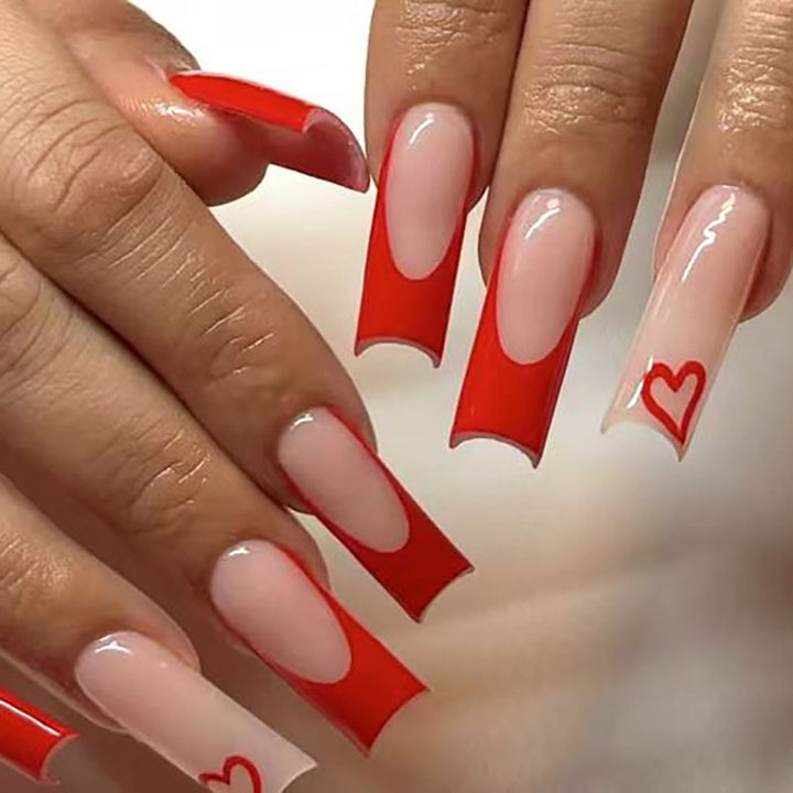 Herz-verzierte Stiletto Press-On Nägel Karnz
