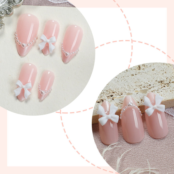 Dekoratives Press-On Nagelkunstset mit elegantem Bogen und Perlenakzenten Karnz