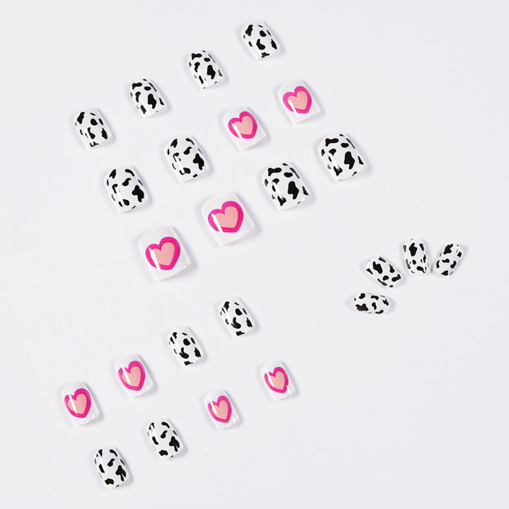 Kreative Nagelkunst mit Herz- und Tiermustermotiv Karnz