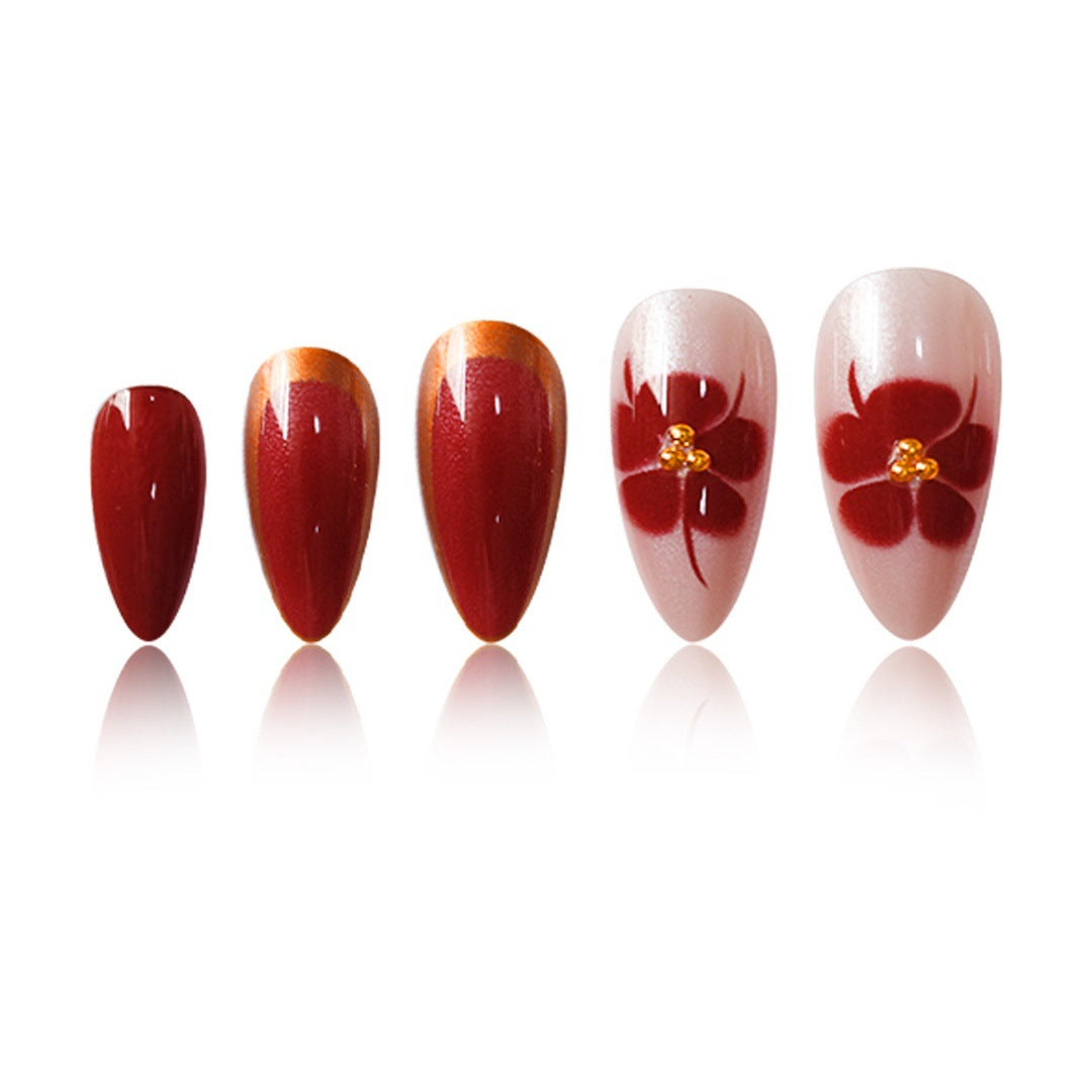 Künstlerisches Press-On-Nagelset mit floralen Akzenten Karnz