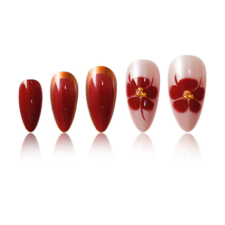Künstlerisches Press-On-Nagelset mit floralen Akzenten Karnz