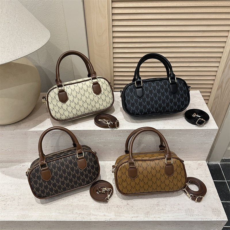 Stylische Monogram-Handtasche