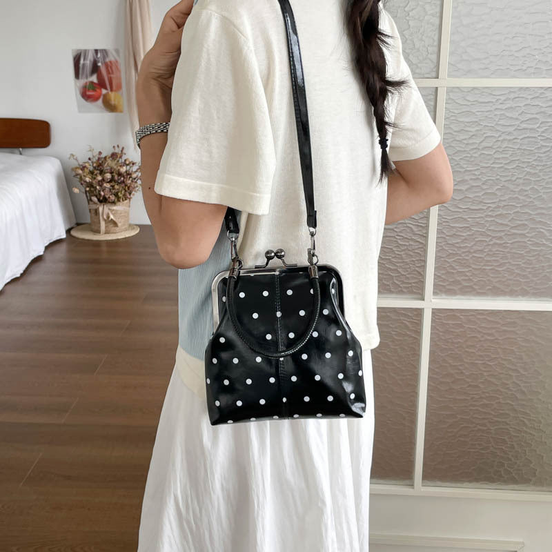 Stylische Pünktchen-Handtasche